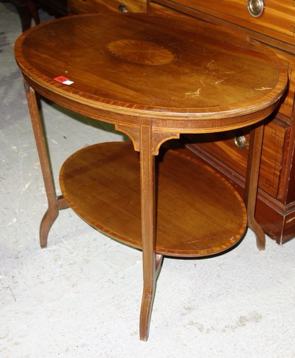 A 19th century mahogany and satinwood banded oval two tier table, 76cm wide.