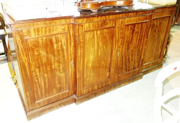 A large mahogany breakfront sideboard with four cupboard doors, 213cm wide.