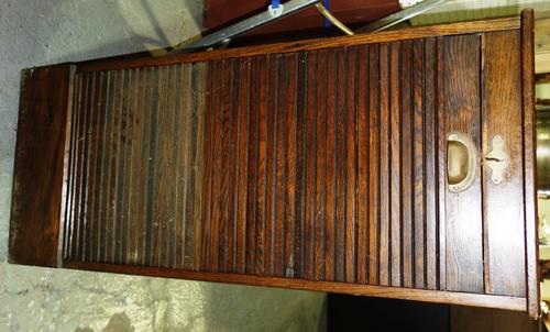 An early 20th century oak tambour fronted filling cabinet, 47cm wide.