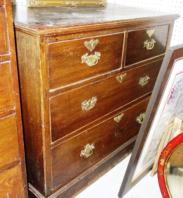 An early 20th century oak chest of two short and two long  drawers, 91cm wide.