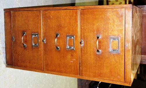 An early 20th century oak three drawer floor standing filling cabinet, 49cm wide.