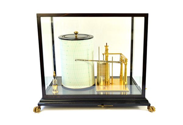 A large barograph by Short and Mason, London, with brass clockwork drum, aneroid recording arm with stop lever and ink bottle in a glazed ebony case o