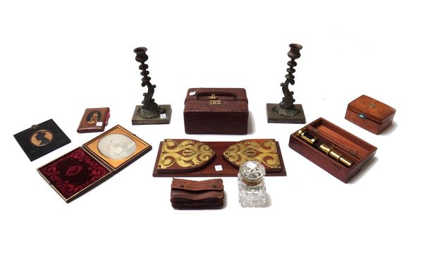 A quantity of collectables, including; a pair of Victorian brass mythological dolphin candlesticks, 23cm high, a leather bound jewellery box, a brass