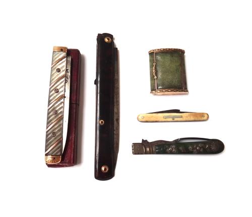 A shagreen and gilt metal mounted vesta box of oval section, mid 19th century, with indistinct stamp to the interior, 4.7cm wide, together with a case