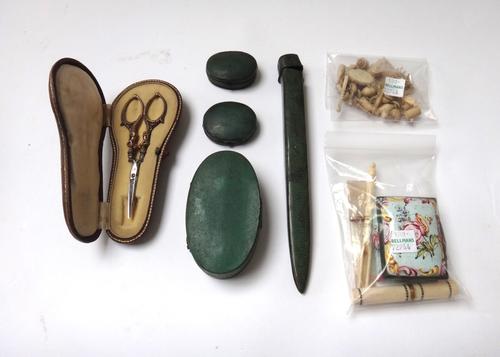 A small group of collectables, to include; an etui, an enamel pill box of casket form, a bone fork, a mother of pearl etui and handle, four shagreen c