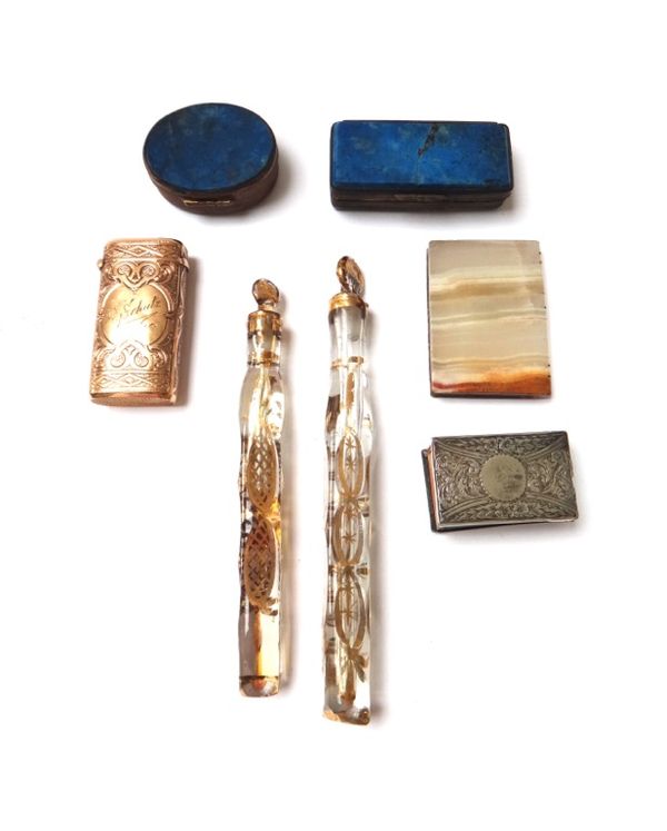 A gold plated vesta, circa 1900, with hardstone inlay, 5.5cm, two 19th century gilt glass scent bottles and stoppers, a silver matchbox holder, two la