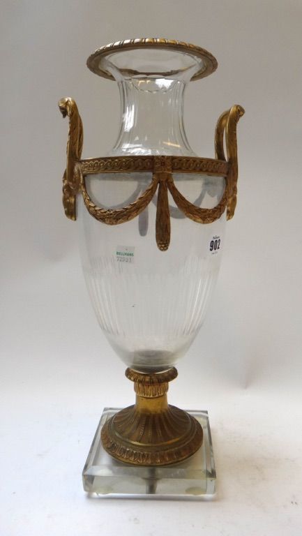 A gilt metal mounted glass vase, circa 1900 of two handled urn form cast with rams head masks, 44cm high.