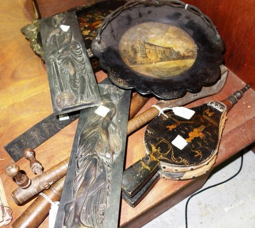 A Regency papier mache plate with brass swingover handle, 25.5cm diameter, a set of chinoiserie decorated bellows, three bronze Art Nouveau plaques ca