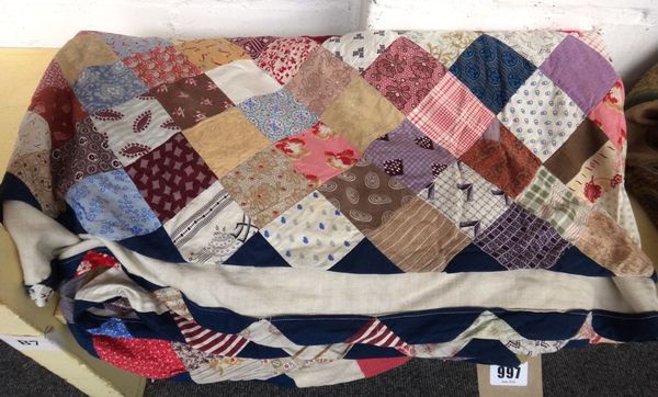 A patchwork quilt, early 20th century, centred with a Union Jack patch, 235cm x 200cm.