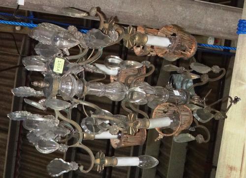 A gilt metal and glass six branch chandelier hung with glass drops.