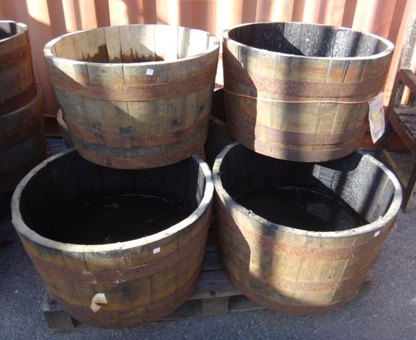A group of four 20th century coopered barrel planters.