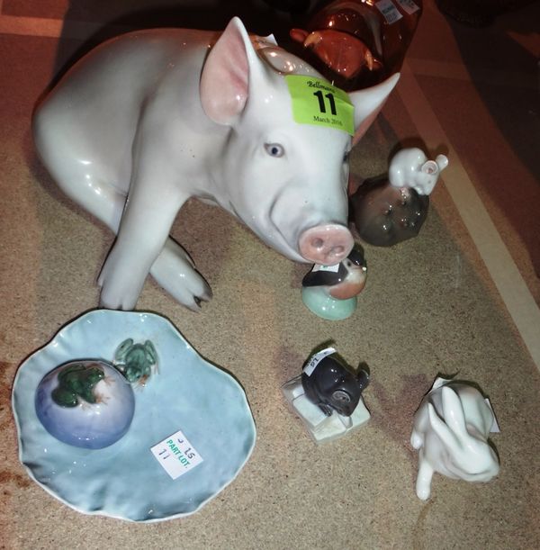 A group of Royal Copenhagen ceramic figures, including a seated pig, mice, bird and others and a Beswick rare breed bull.