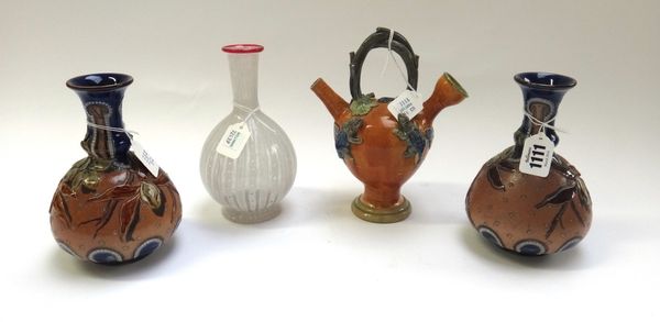 A pair of Doulton Lambeth stoneware bottle neck vases by Edith D Lupton, dated 1887, 16cm high, together with a Caldas Portuguese pottery oil jar deco