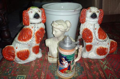 A large pair of Staffordshire spaniels and a white resin bust of a lady, a German ceramic tankard and a white glaze slop bucket.