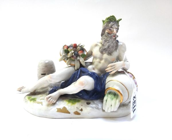 A Meissen figure of a river god, late 19th century, with blue crossed swords marks and incised model no.813, after a model by J.J Kändler, emblematic