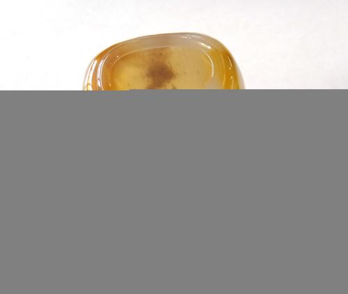 A Meissen porcelain figure, early 20th century, titled 'Je les enflame', blue crossed swords mark, 13cm high.