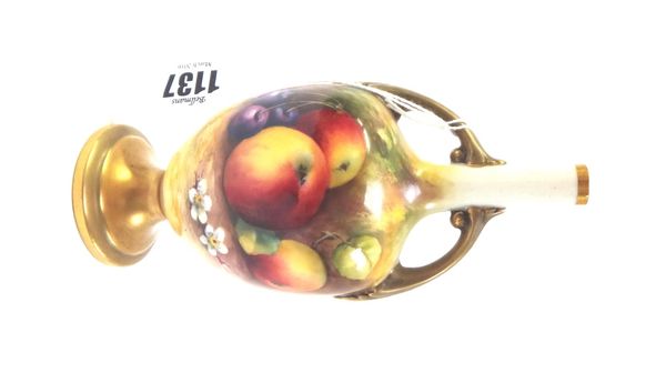 A Royal Worcester two handled porcelain vase, circa 1930, painted with fruit and indistinctly signed, 17cm high.