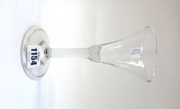 An English wine glass, late 18th century, with bell bowl, plain stem and a circular foot, 16.5cm high.