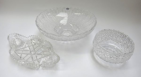 A large cut glass pedestal bowl, 20th century, 36cm diameter, together with a similarly cut oval dish and a moulded glass bowl. (3)