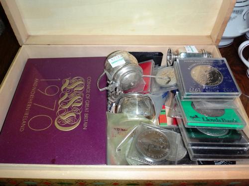 A three piece silver condiment set together with a quantity of pre-1952 coins.
