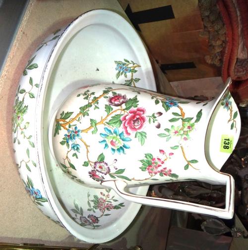 An 'Addersley' floral decorated wash bowl and matching jug.