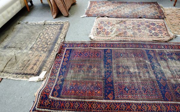 Four Beluchistan rugs. (4)