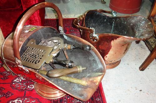 Two copper coal scuttles and a quantity of brass.