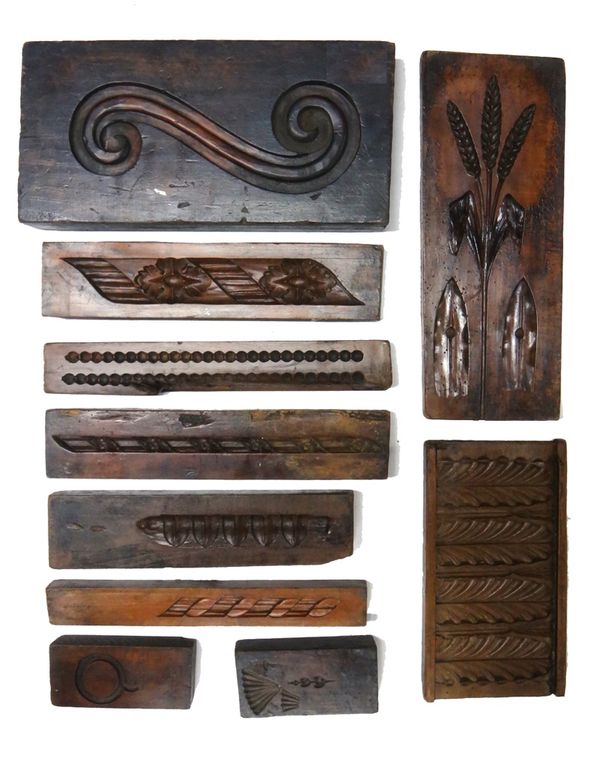 A group of ten 19th century English boxwood framing moulds, including five running pattern moulds, an 'ear of corn' motif, a foliate frieze and three