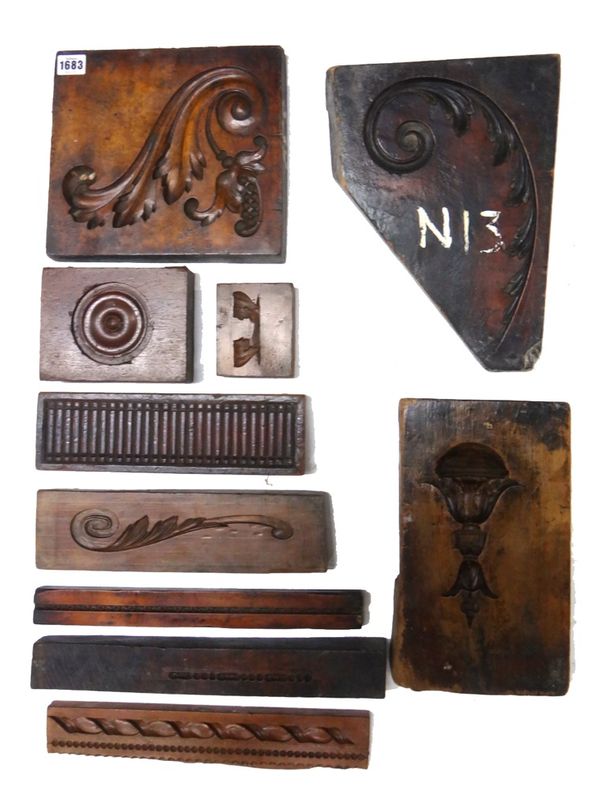 A group of ten 19th century English boxwood framing moulds, including three running pattern moulds, a frieze section and six swags/details.(10)