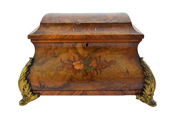 A 19th century French marquetry inlaid figured walnut gilt metal mounted casket of bombe form, 38cm wide.  Illustrated