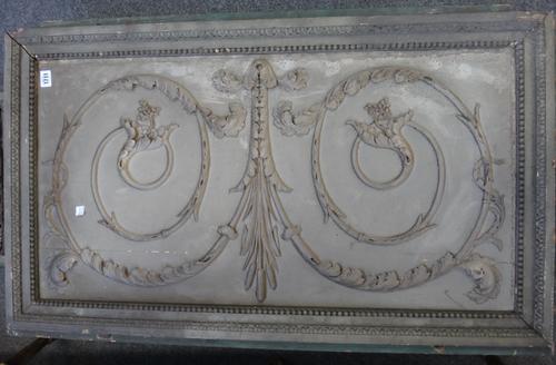 A group of six grey and green painted carved boiserie panels of Louis XVI style.