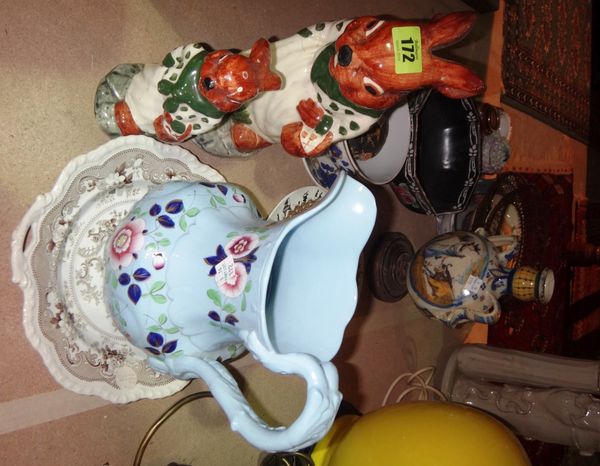 A quantity of ceramics including Burslem rabbits, a Dutch style twin handled vase, jugs, bowls, plates and sundry.