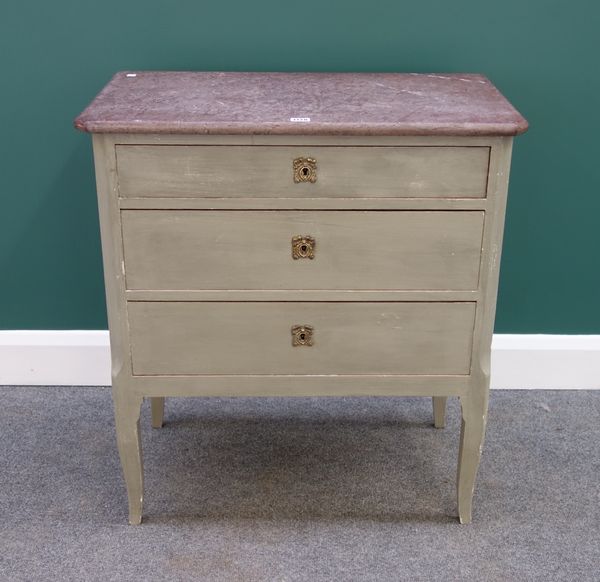 An early 20th century French commode, the canted rouge marble top over a painted base of three long drawers, on slender cabriole supports, 74cm wide.