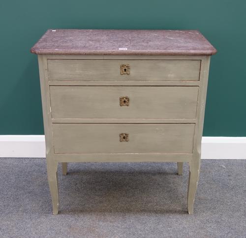An early 20th century French commode, the canted rouge marble top over a painted base of three long drawers, on slender cabriole supports, 74cm wide.