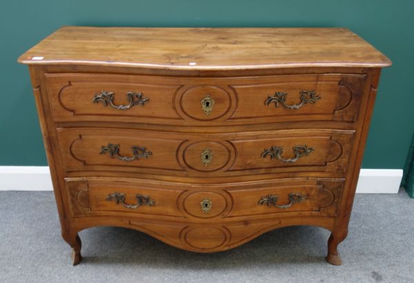 An 18th century French fruitwood commode, with three serpentine long drawers, on squat cabriole hoof feet, 127cm wide.