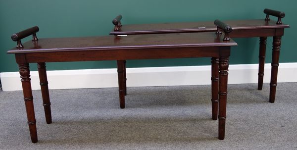 A pair of early 19th century style mahogany window seats, with turned end stops and supports, each 104cm wide.