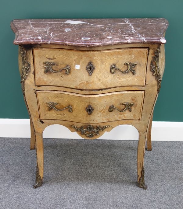 A Louis XV style gilt metal mounted marquetry inlaid mahogany commode, the serpentine marble top over a bombe two drawer base, on tall splayed support