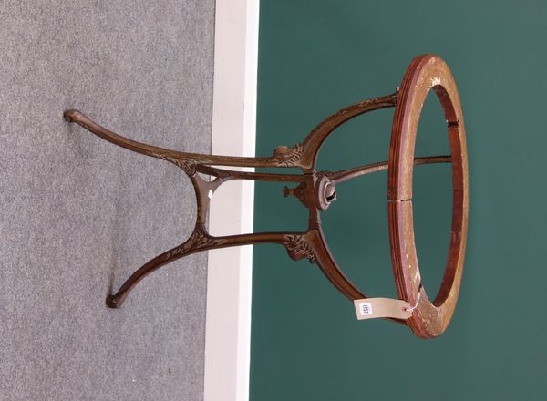 A late Victorian globe stand, with paper meridian ring, on three cast iron downswept supports, 62cm wide, (this lot will take an 18 inch globe).