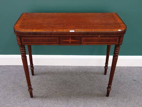 A Regency inlaid mahogany card table on tapering turned supports, 90cm wide.