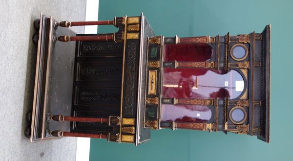 A 17th century continental style polychrome painted display cabinet on stand, the elaborate glazed upper section over four frieze drawers, raised on f