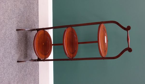 An Edwardian inlaid mahogany circular folding three tier cake stand, together with an Edwardian inlaid circular two tier jardiniere stand on splayed s