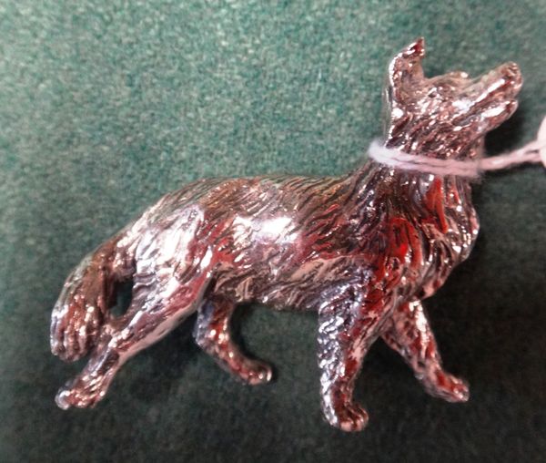 A small white metal Animalier figure of a Collie dog 4.5cms high