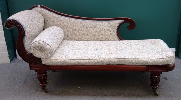 A Victorian mahogany framed chaise longue, with scroll end on tapering reeded supports, 167cm wide.