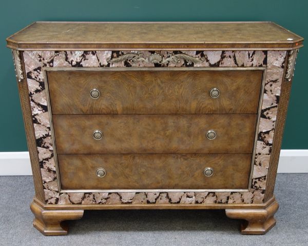 A pair of 18th century style mother of pearl inlaid oak chests, each with three long drawers, flanked by scale carved canted corners, on ogee bracket