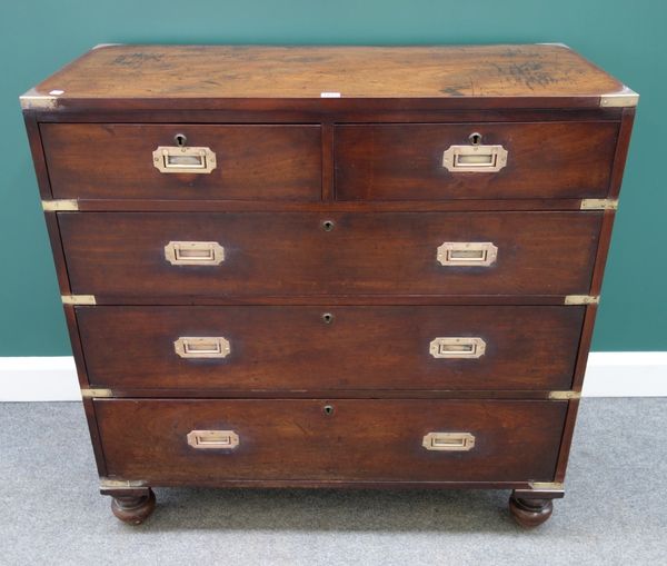 A 19th century campaign style mahogany chest of two short and three long graduated drawers, on turned feet, 104cm wide.