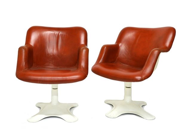 Yrjo Kukkapuro; a pair of mid 20th century 'Karuselli' lounge chairs, with brown leatherette upholstery on white painted metal four point bases.  Illu