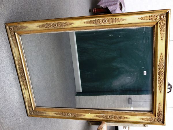 An early 19th century cream painted rectangular wall mirror with moulded frame, 108cm wide x 153cm high.