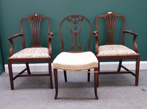 A pair of 18th century style mahogany carver chairs with pierced splat on tapering square supports, together with a similar single chair. (3)