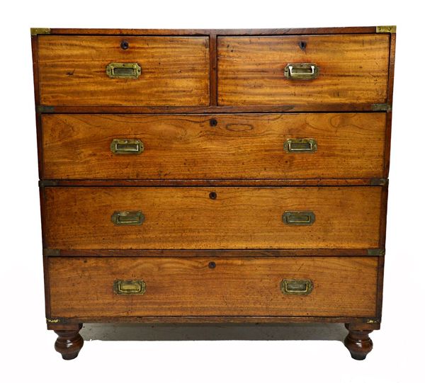 A 19th century brass bound mahogany two part campaign chest of two short and three long drawers, on turned feet, 106cm wide.  Illustrated