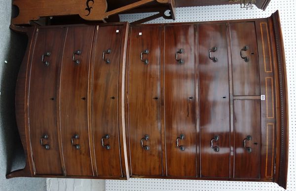 An early 19th century inlaid mahogany bowfront chest of two short over six long graduated drawers, on splayed bracket feet, 118cm wide x 196cm high.